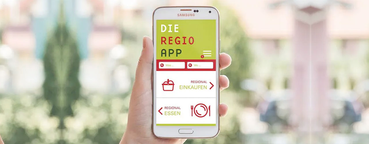 Handy mit der Regio-App mit den Kategorien "Regional einkaufen" und "Regional essen"